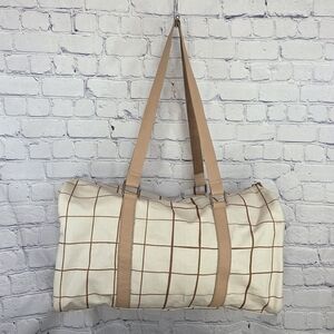 Tan and Cream Travel Bag with Geometric Pattern